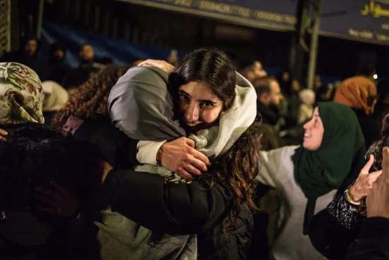 AFP__20250120__36UR46Z__v1__HighRes__PalestinianIsraelConflictCeasefirePrisoners-1737334172-1737336323.jpg